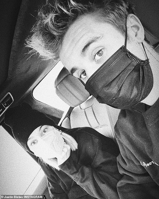 justin-bieber-dons-a-face-mask-during-a-rare-outing-with-wife-hailey-while-urging-fans-to-stay-safe-1