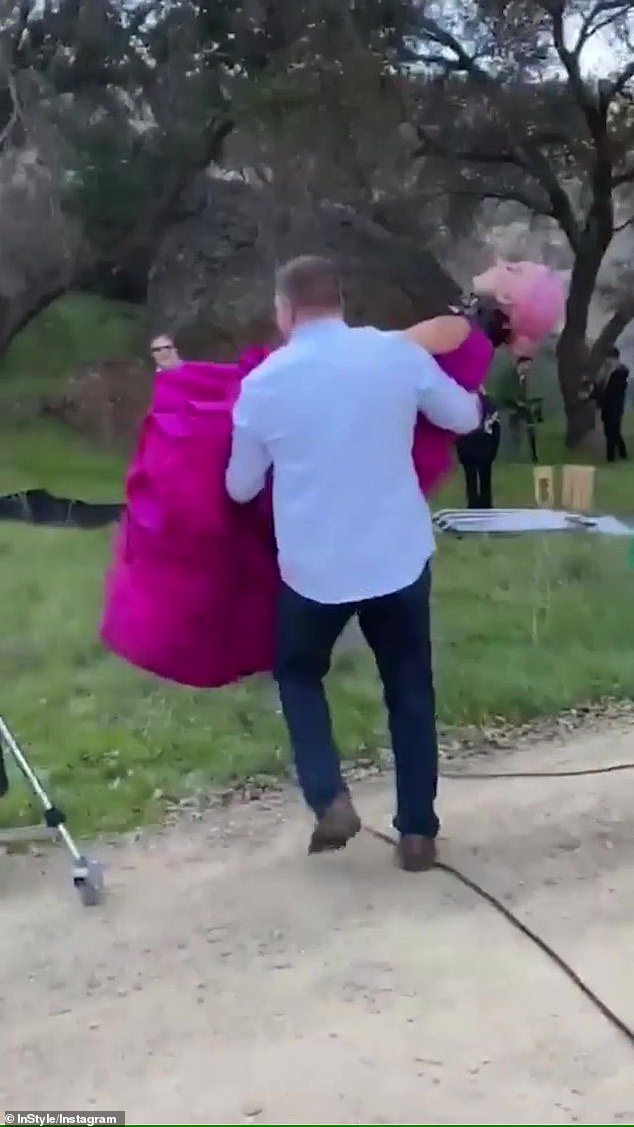 lady-gaga-has-to-be-carried-to-photoshoot-due-to-massive-dress-4