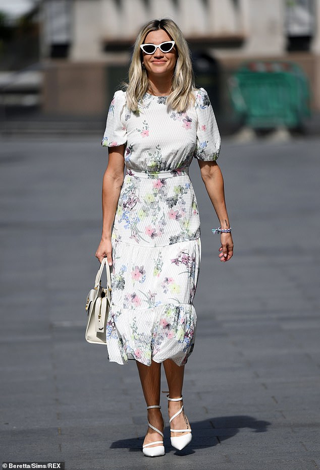 ashley-roberts-nails-springtime-chic-in-a-floral-print-midi-dress-and-cat-eye-shades-1