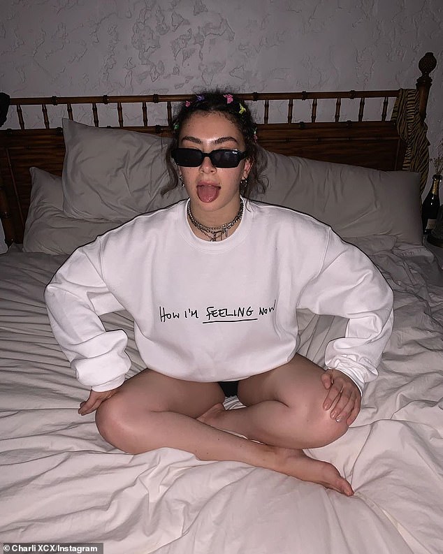 charli-xcx-shows-off-her-slender-legs-as-she-models-new-2