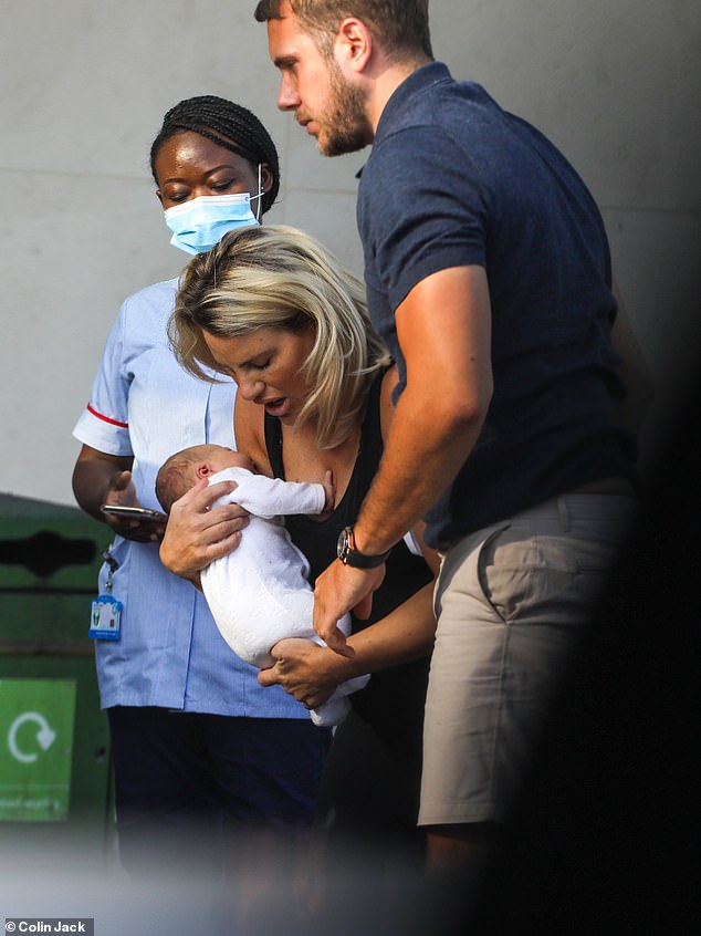 danielle-armstrong-cradles-newborn-daughter-orla-mae-as-she-and-fiance-tom-edney-3