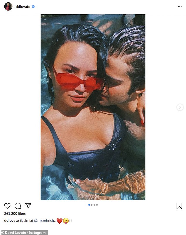 demi-lovato-packs-on-the-pda-with-her-boyfriend-max-ehrich-in-steamy-poolside-3