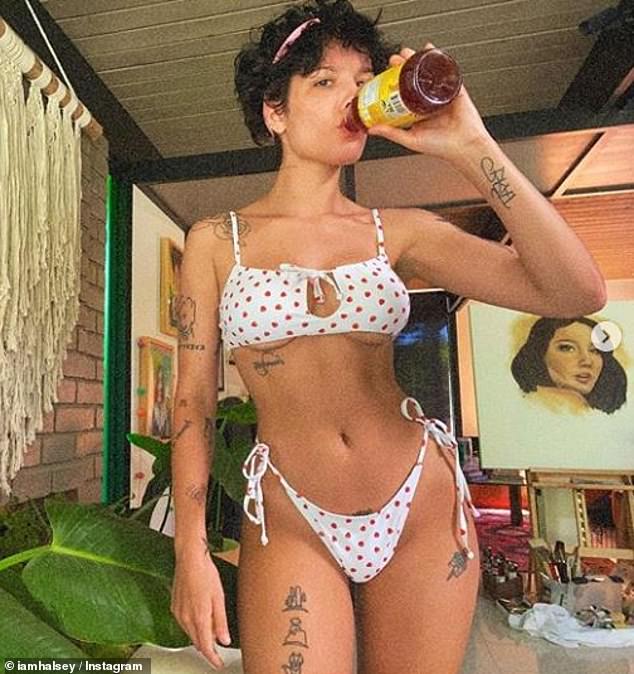 halsey-lays-back-and-flaunts-her-curves-in-a-tie-dye-bikini-top-3