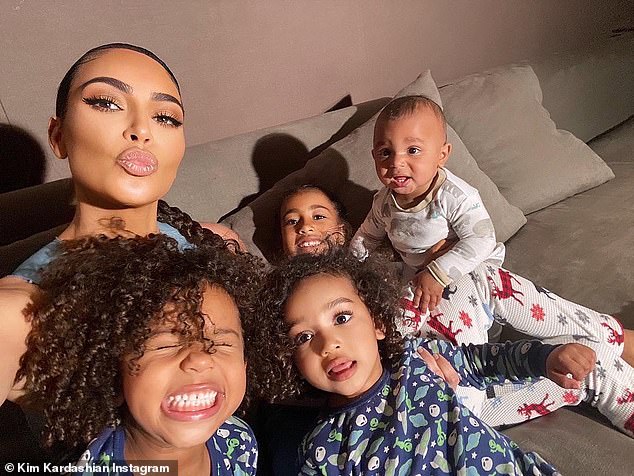 kim-kardashian-is-all-smiles-as-she-gathers-her-four-kids-for-selfies-1