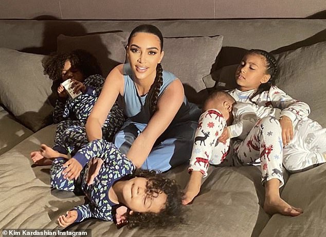 kim-kardashian-is-all-smiles-as-she-gathers-her-four-kids-for-selfies-2