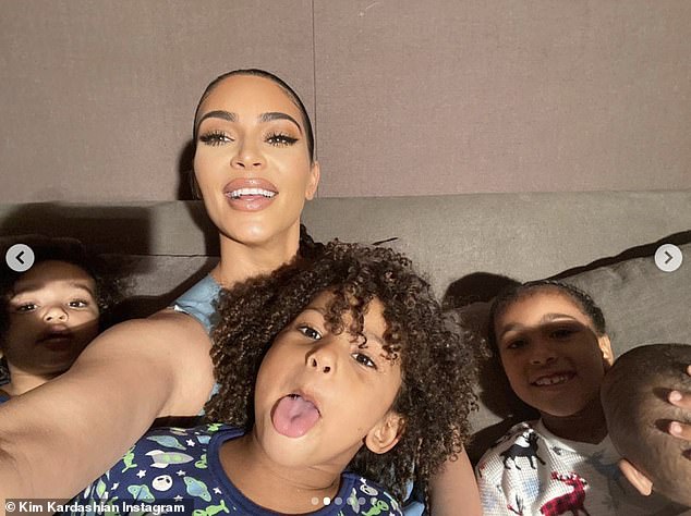 kim-kardashian-is-all-smiles-as-she-gathers-her-four-kids-for-selfies-5