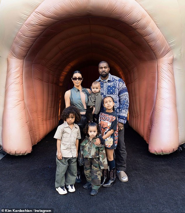 kim-kardashian-is-all-smiles-as-she-gathers-her-four-kids-for-selfies-6