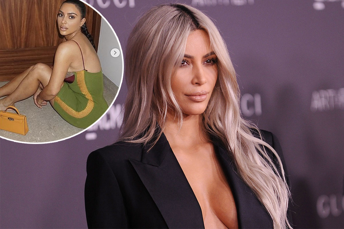 Kim Kardashian showcases her hourglass curves in tight dress as she celebrates