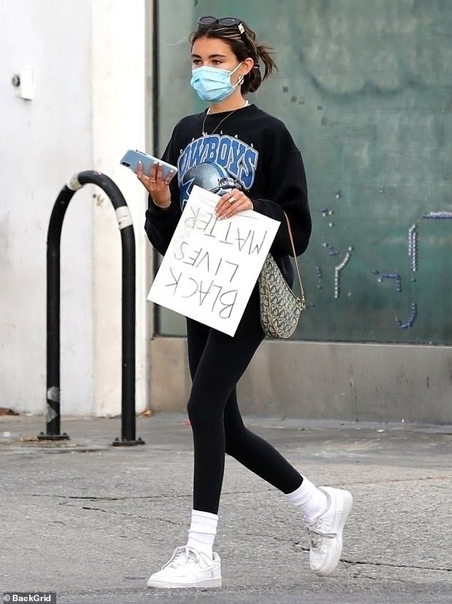 madison-beer-wields-a-handmade-black-lives-matter-sign-and-heads-back-to-her-range-rover-1