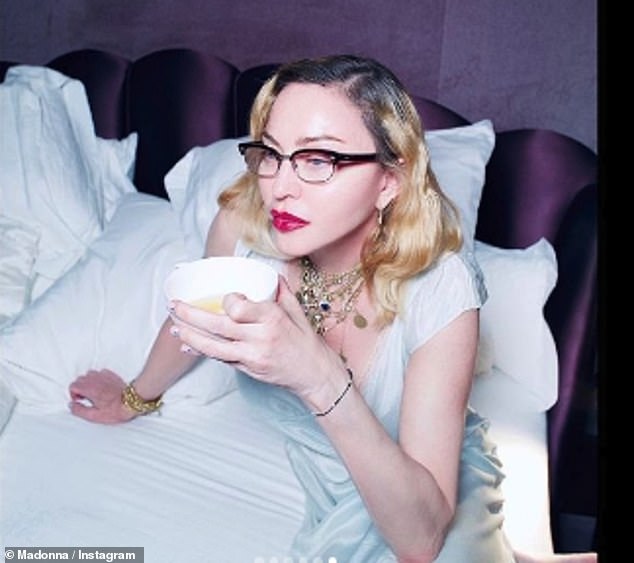 madonna-looks-glamorous-in-a-plunging-ivory-satin-gown-2
