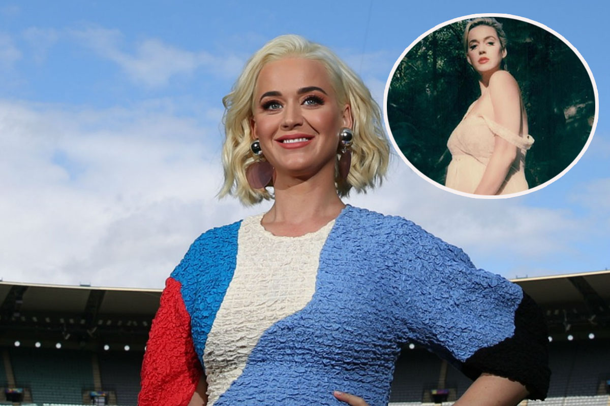 Pregnant Katy Perry displays her baby bump in pastel yellow dress