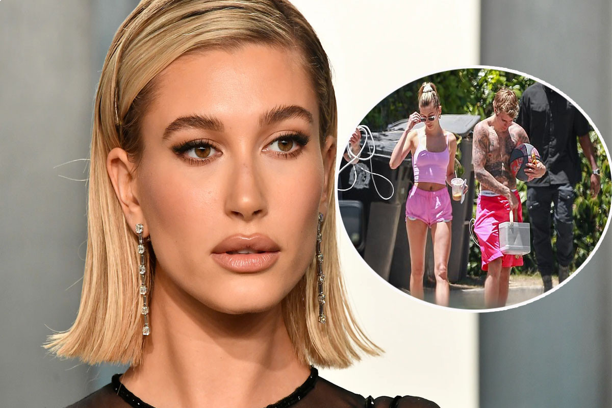 Hailey Bieber rocks a pink crop top with tiny shorts as she joins her shirtless husband Justin Bieber