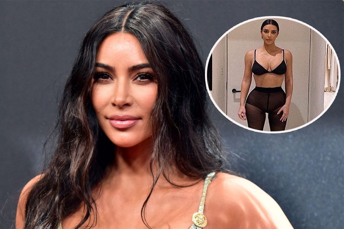 Kim Kardashian displays her signature curves in black bra and pantyhose