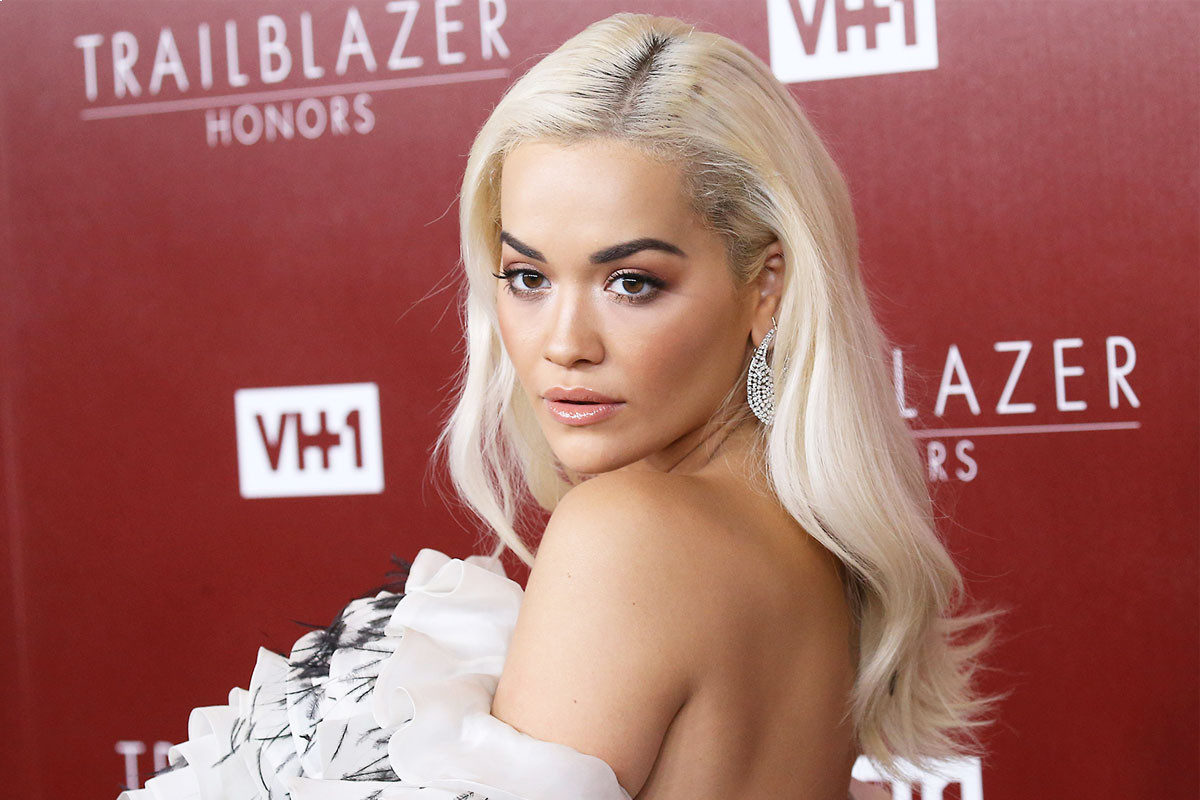 Rita Ora smooches skeleton in playful snap as she takes look at immersive video experience