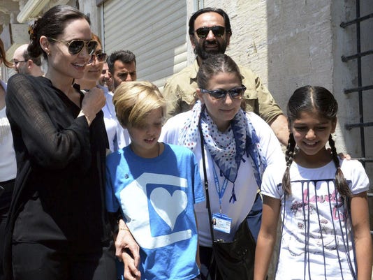 Angelina-Jolie-raises-her-kids-to-do-the-altruistic-deed-3
