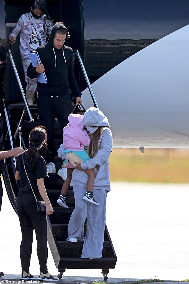 Beyonce-and-Jay-Z-mask-up-as-they-exit-their-private-plane-2