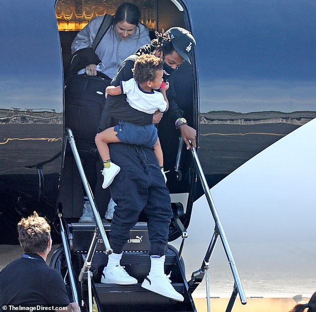 Beyonce-and-Jay-Z-mask-up-as-they-exit-their-private-plane-4