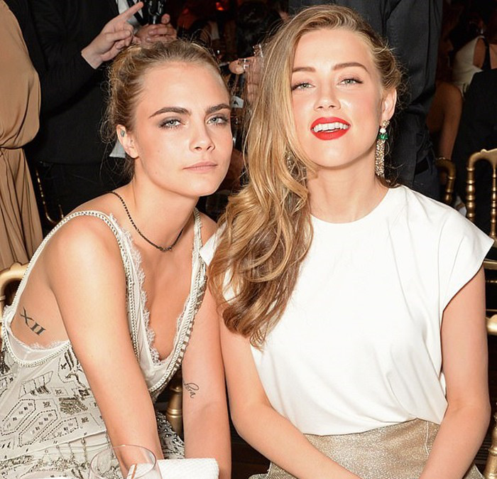 amber-heard-accused-of-having-an-affair-with-supermodel-cara-delevingne-and-49-year-old-billionaire-1