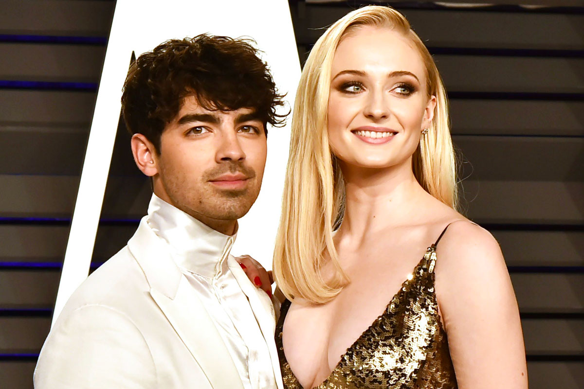 Sophie Turner shows her baby bump while walking with Joe Jonas during break from quarantine