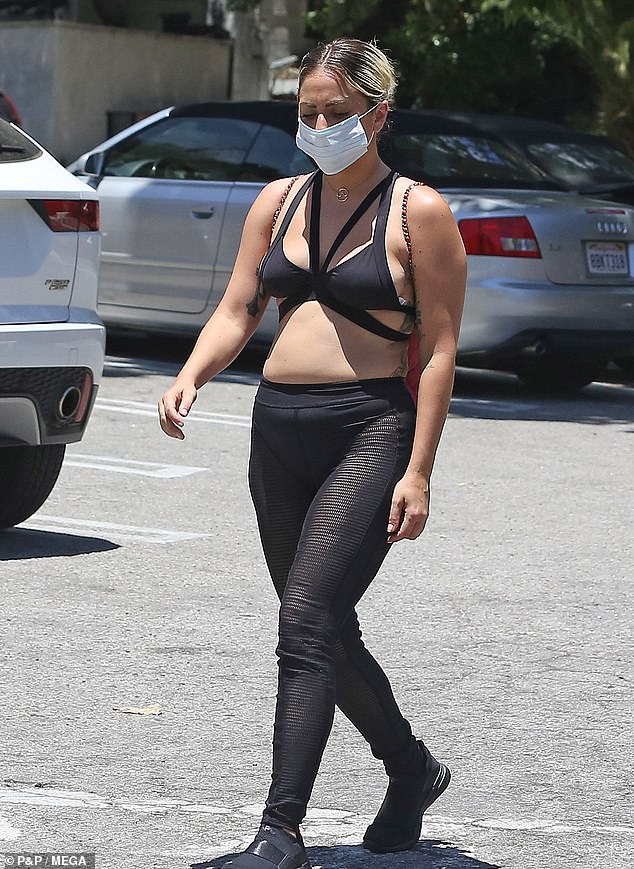 lady-gaga-masks-up-and-holds-hands-with-boyfriend-michael-polanksy-as-she-wears-strappy-bra-top-3