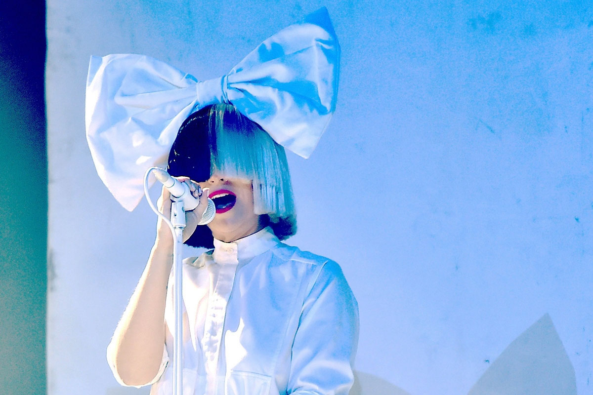 Sia reveals as she performs new single Together with dancer muse Maddie Ziegler