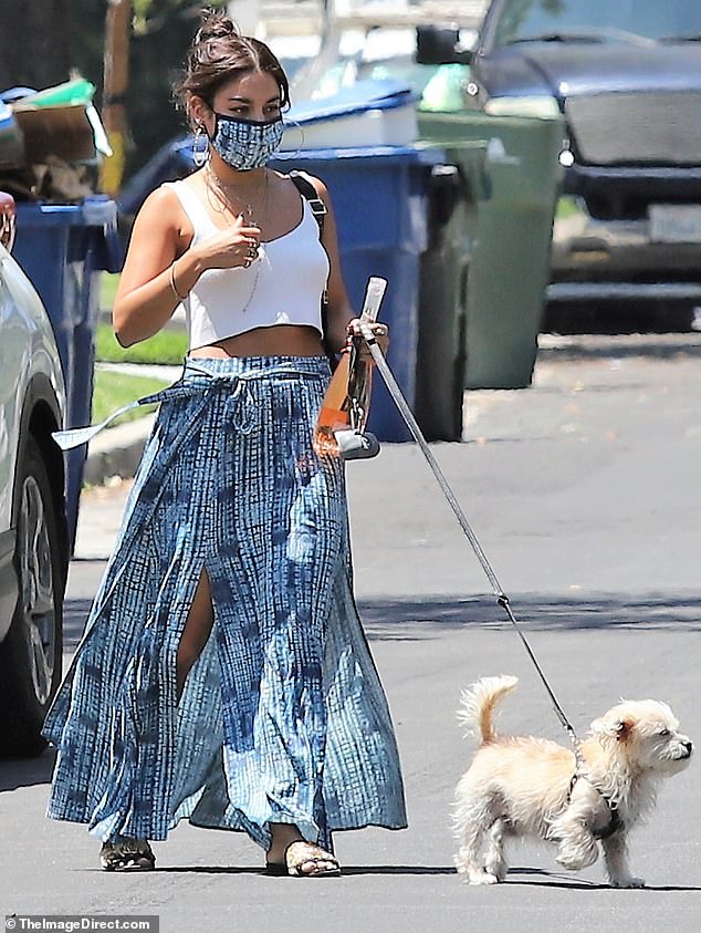Vanessa-Hudgens-flashes-for-bohochic-look-for-her-dog-walking-2
