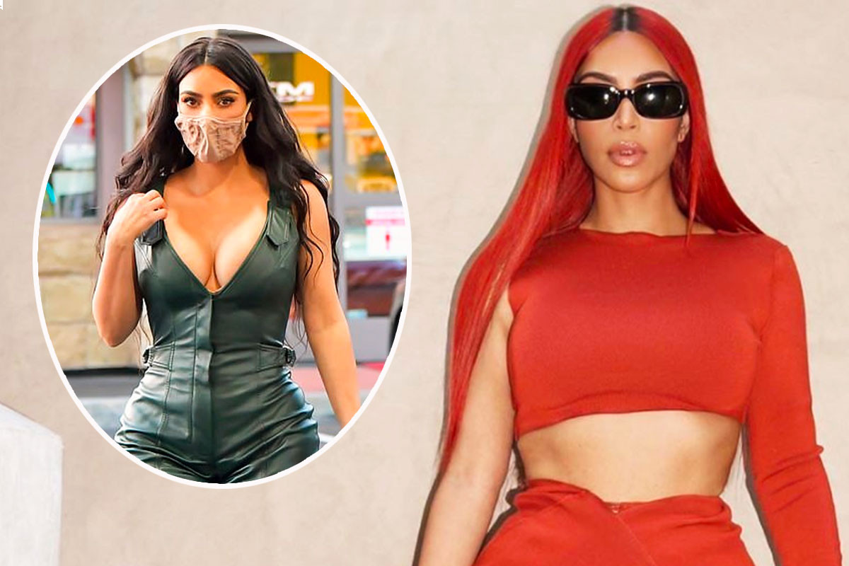 Kim Kardashian backs to brunette after slaying bright red hair