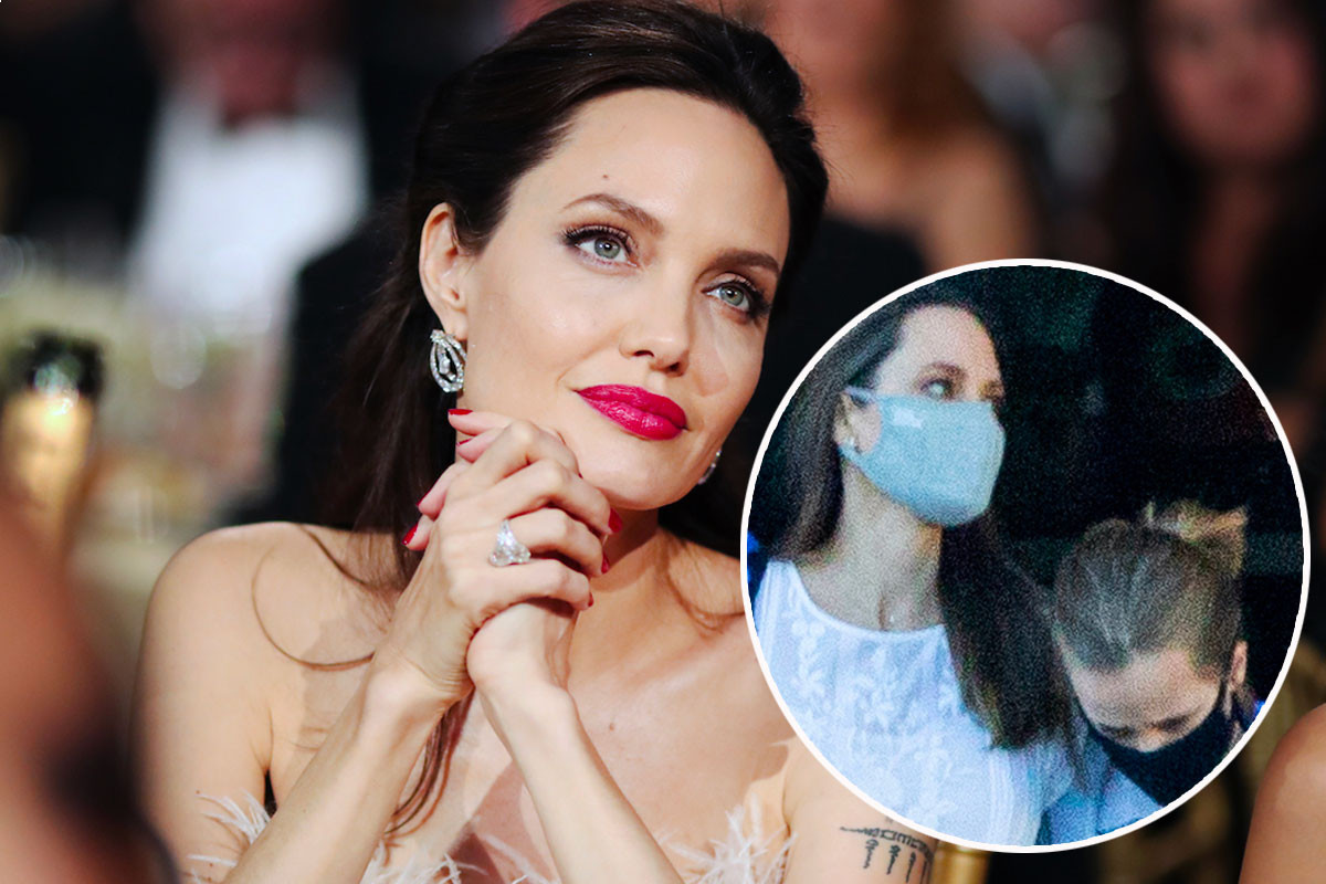 Angelina Jolie spotted in mask for first time in months with daughter Vivienne