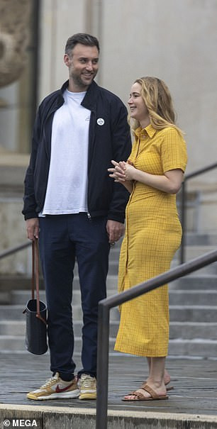 All smiles: Jennifer and Cooke enjoy their day out taking in the sights
