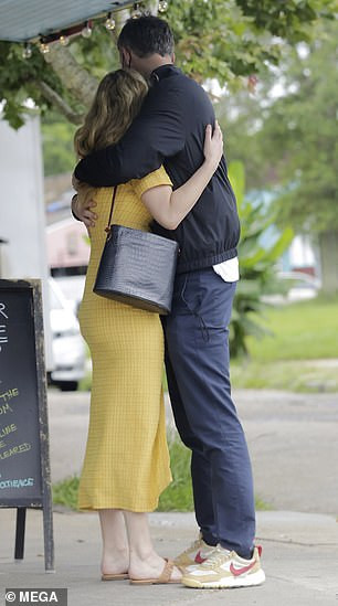 Romantic: The couple were seeing hugging after enjoying a late lunch together