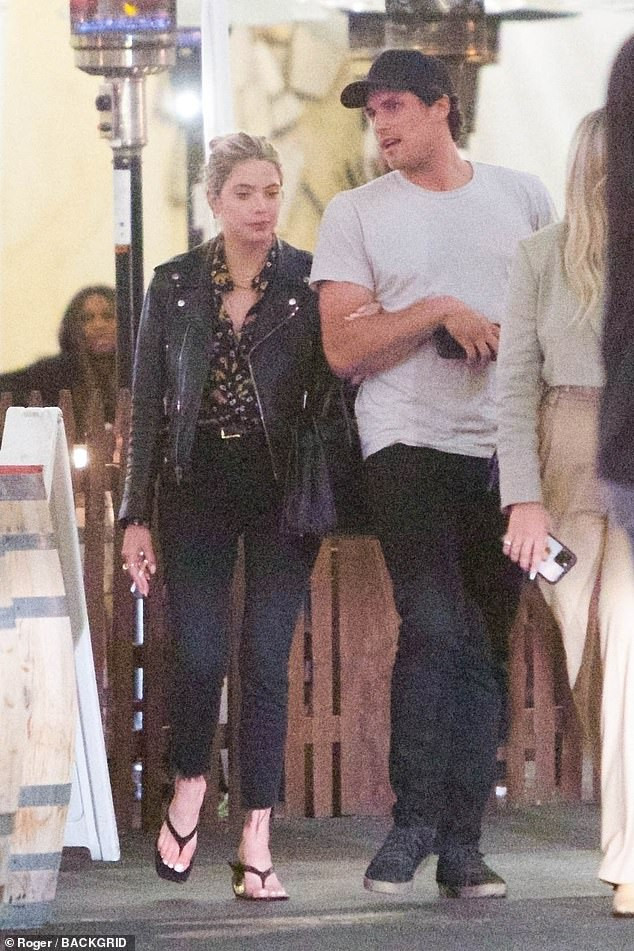 Making it official: Ashley Benson was spotted out with her new man Colby Ammerman as the pair dined out with friends at the Saddle Ranch in West Hollywood