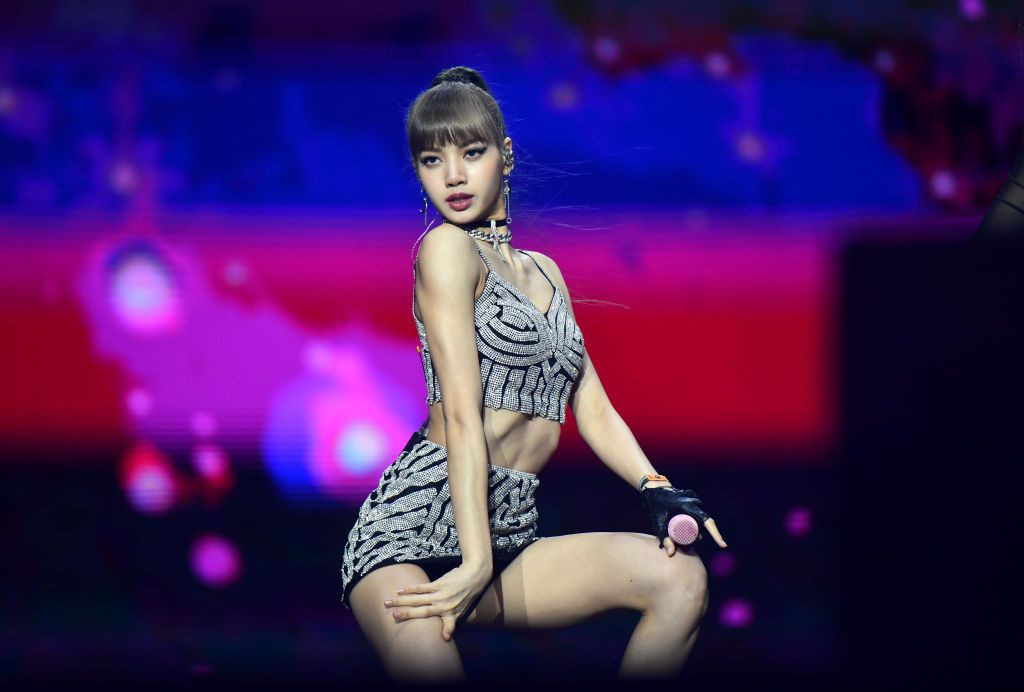 INDIO, CALIFORNIA - APRIL 12: (L-R) Singer Lisa of BLACKPINK performs onstage during the 2019 Coachella Valley Music and Arts Festival on April 12, 2019 in Indio, California. (Photo by Scott Dudelson/Getty Images for Coachella)